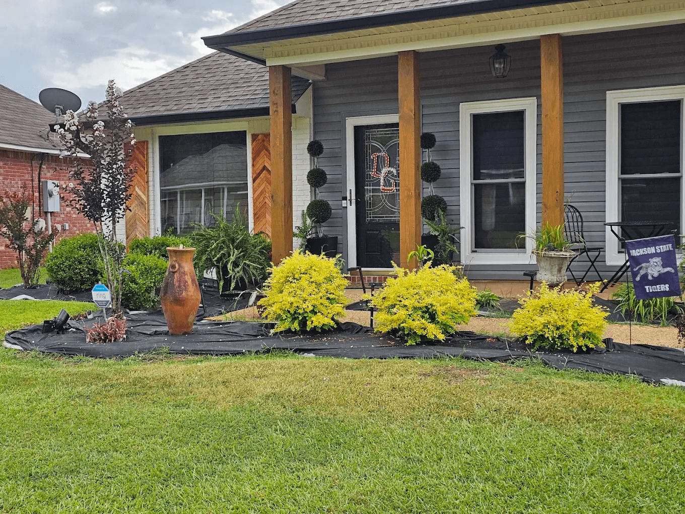 Completed WinChoice window installation on a single-story home with a covered front porch